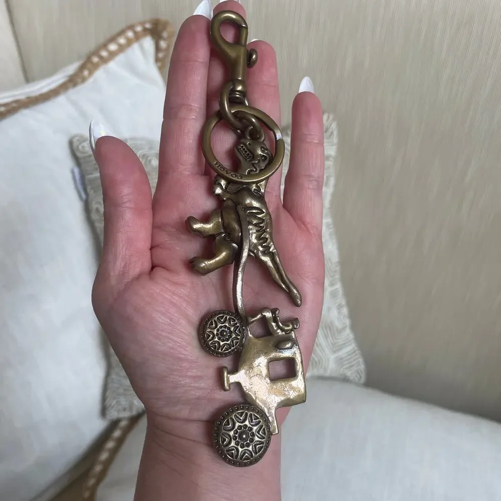 RARE Coach Rexy Horse & Carriage Bag Charm 24011 | Brass Dinosaur